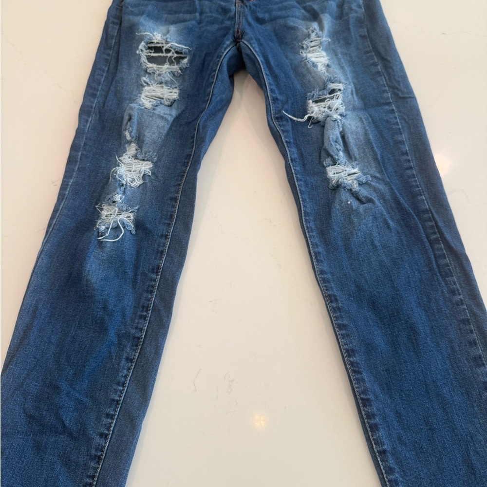 Women's Distressed Blue Boot Cut Jeans